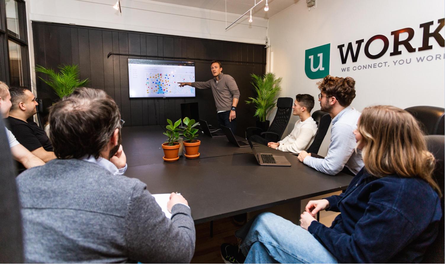 COO, Christopher leading a workshop.